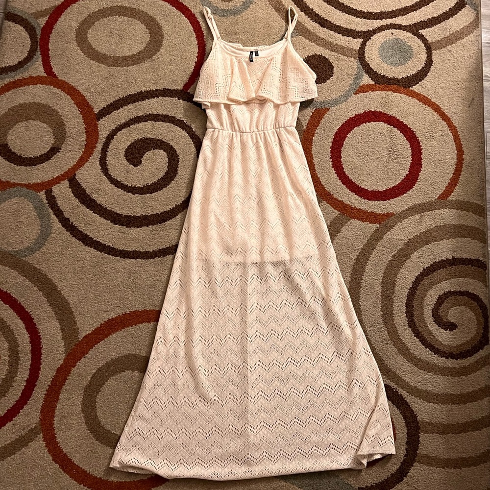 Tan long dress with spaghetti straps.